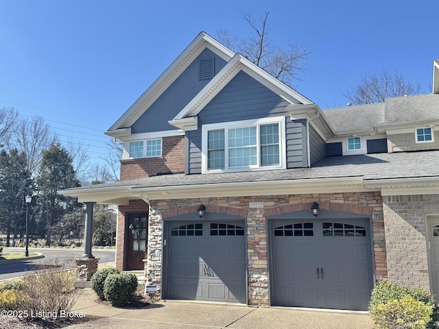 view of front of property with concrete driveway, an attached garage, and brick siding