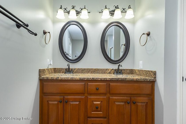 full bathroom featuring a sink and double vanity