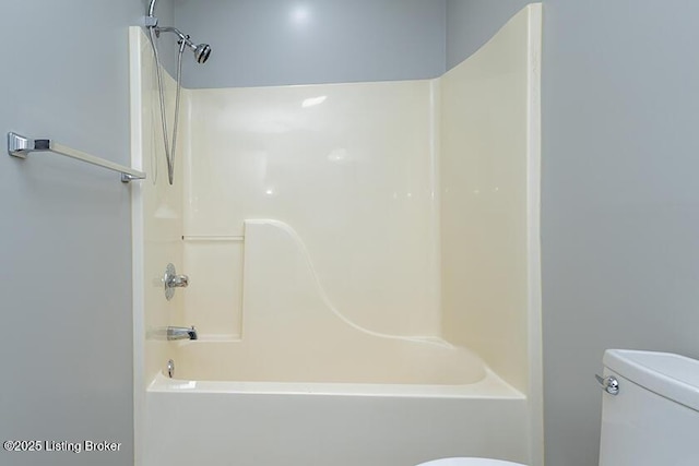 full bath with toilet and tub / shower combination