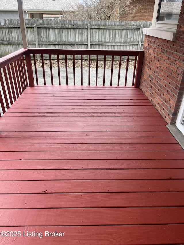 wooden deck featuring fence
