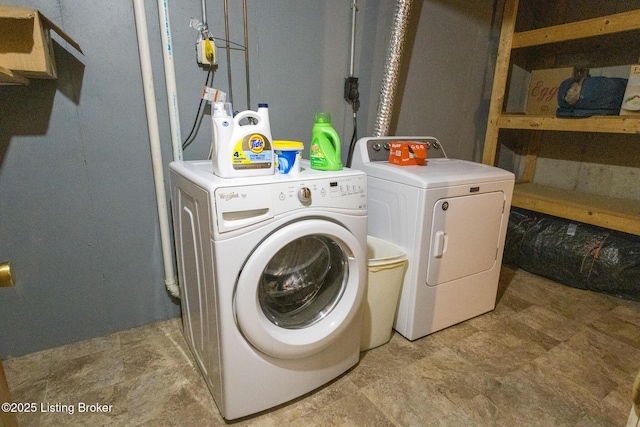 clothes washing area with laundry area and washing machine and dryer