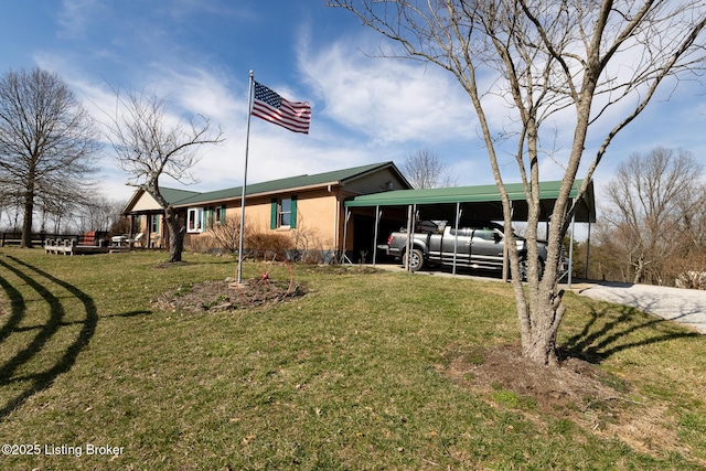 exterior space featuring a carport and a front lawn