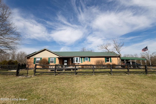 view of front of house featuring a front yard and a fenced front yard