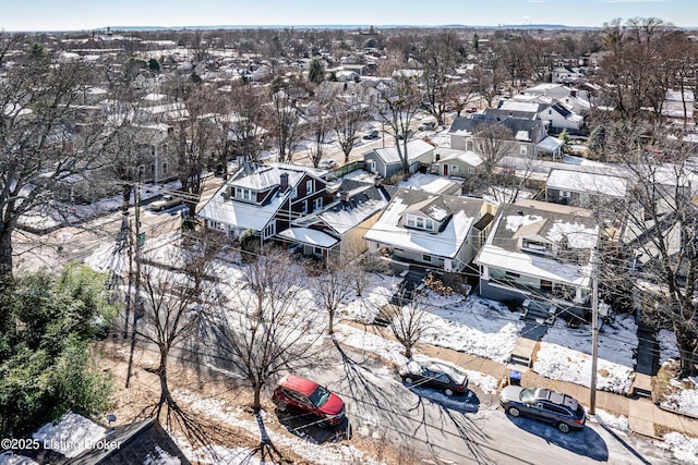 birds eye view of property with a residential view