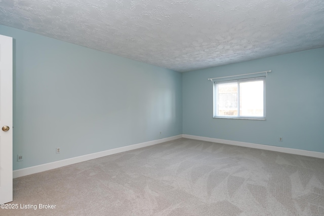 5800 Coach Gate Wynde Unit 295B, Louisville, KY 40207 - carpeted spare room with a textured ceiling and baseboards