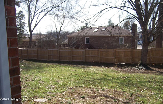 view of yard with fence