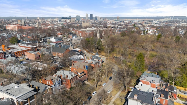 birds eye view of property featuring a city view