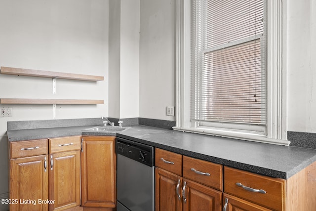 kitchen with open shelves, dark countertops, dishwasher, and a sink