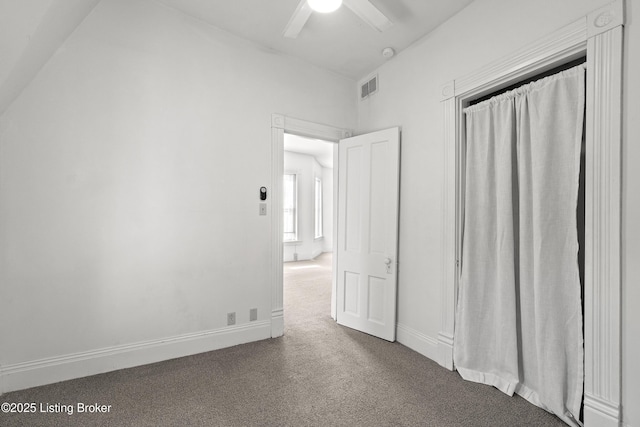 unfurnished bedroom with visible vents, ceiling fan, baseboards, and carpet floors