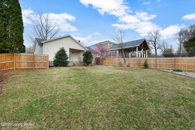 view of yard featuring a fenced backyard