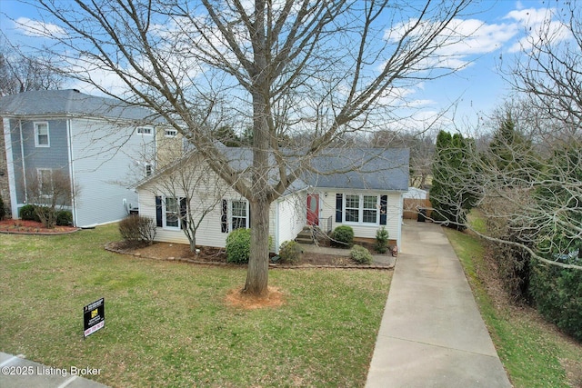 view of front of home with a front yard