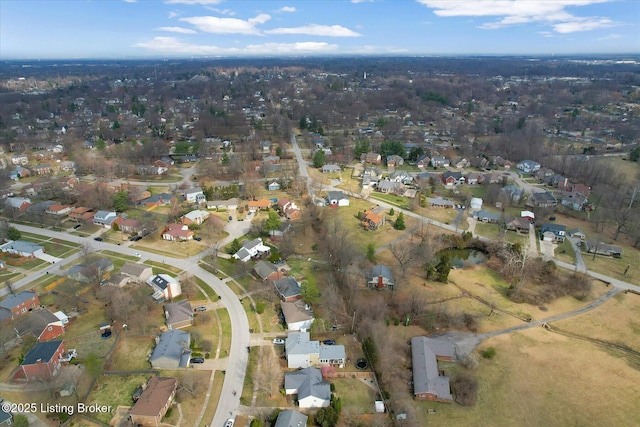 birds eye view of property with a residential view