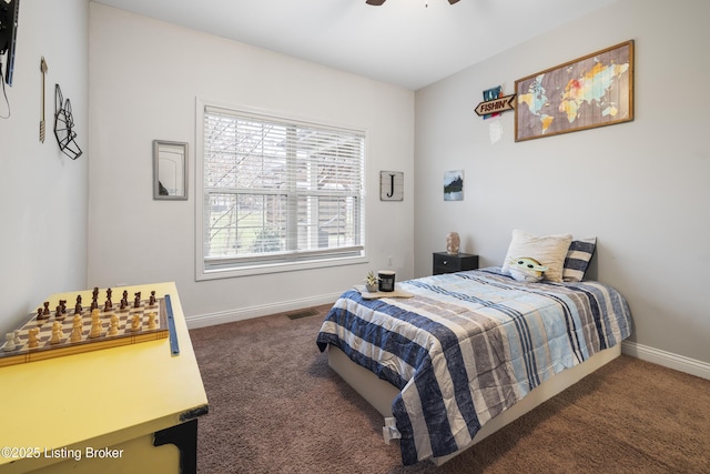 carpeted bedroom with visible vents, ceiling fan, and baseboards