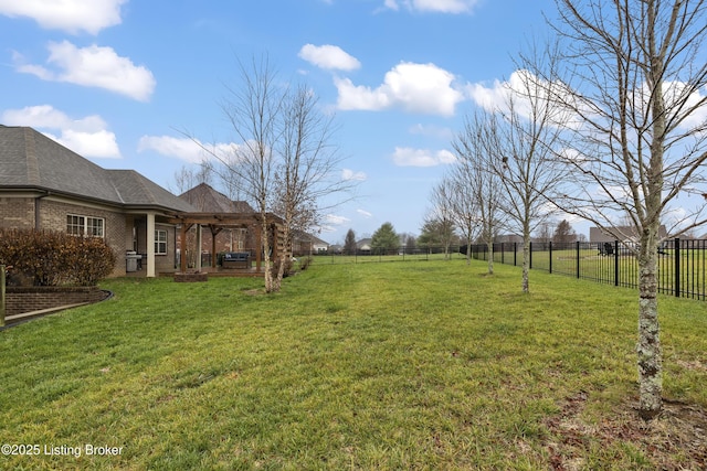 view of yard featuring a patio, a pergola, and a fenced backyard