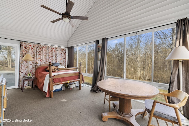 bedroom featuring carpet flooring, multiple windows, and high vaulted ceiling