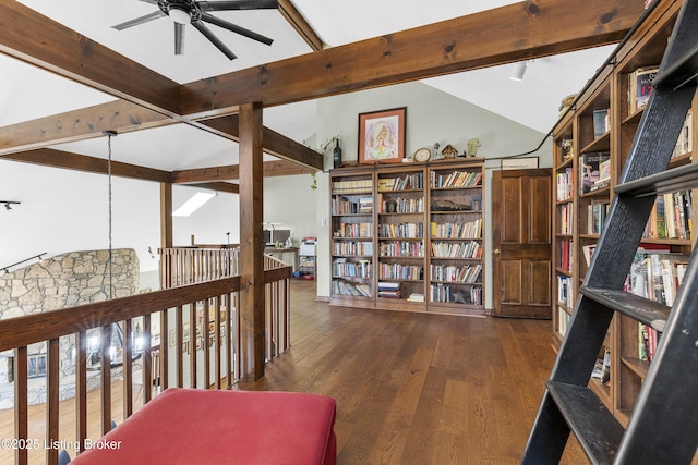 sitting room with vaulted ceiling with beams, ceiling fan, and wood finished floors