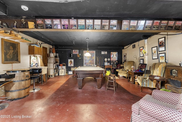 recreation room with finished concrete floors and billiards