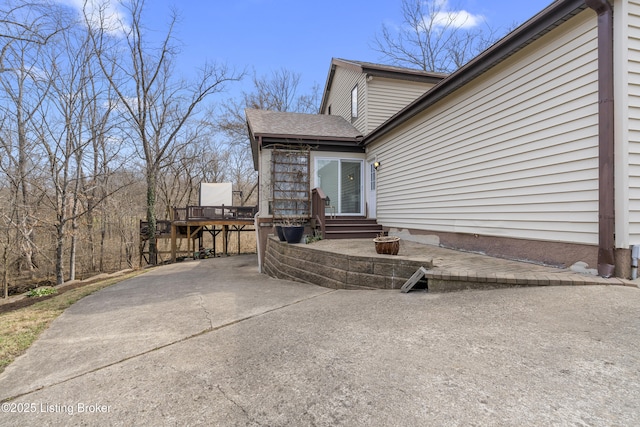 view of patio with a wooden deck