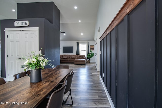 hall with recessed lighting, wood finished floors, and baseboards