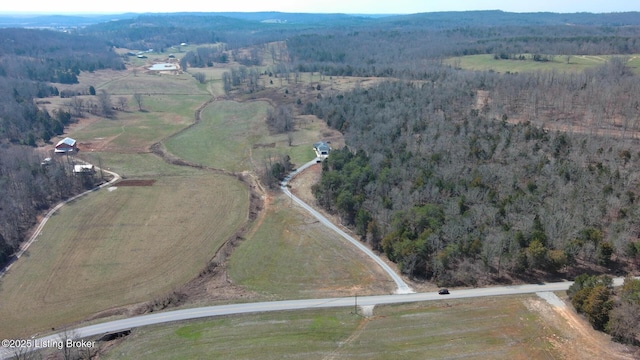 aerial view featuring a forest view