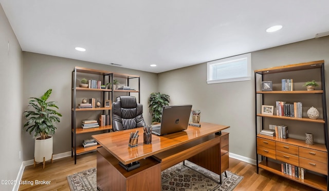 home office with visible vents, recessed lighting, baseboards, and wood finished floors