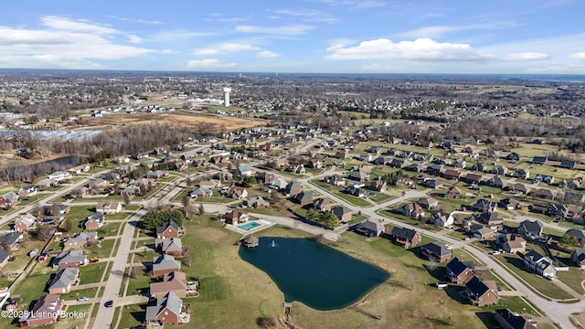 bird's eye view with a residential view and a water view