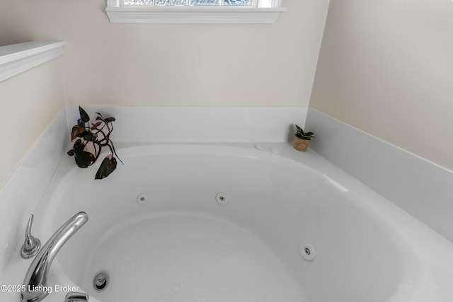 interior details featuring a whirlpool tub