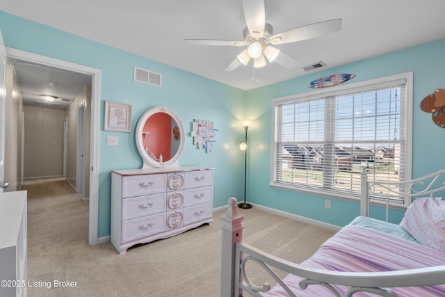 bedroom featuring a ceiling fan, light colored carpet, visible vents, and baseboards