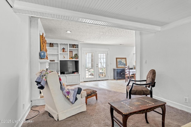 living area featuring light tile patterned floors, light carpet, baseboards, and ornamental molding