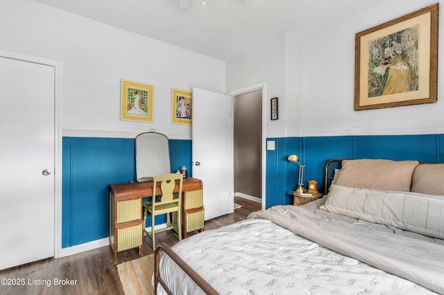 bedroom with wood finished floors