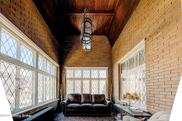 sunroom / solarium with wood ceiling