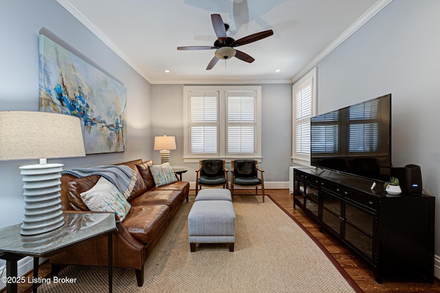 living room with wood finished floors, recessed lighting, crown molding, baseboards, and ceiling fan