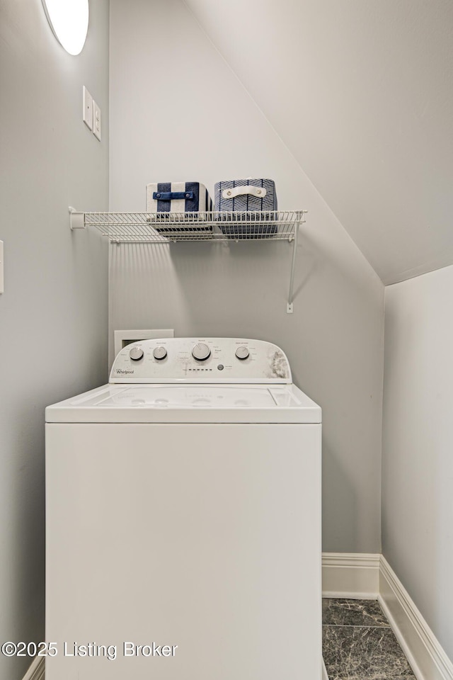 washroom featuring washer / dryer, baseboards, marble finish floor, and laundry area