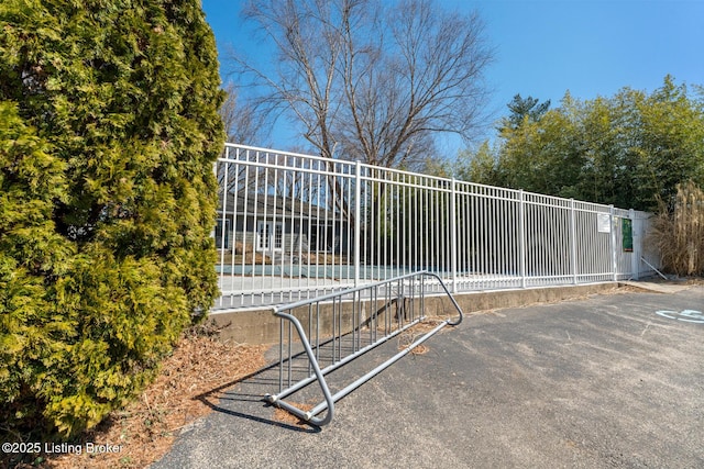 view of gate with fence