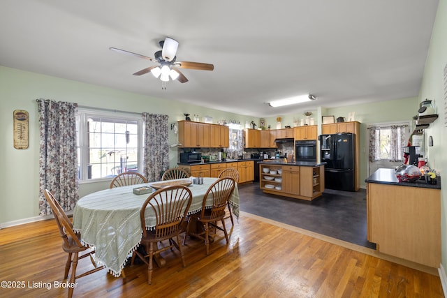 1380 Rice Rd, Lawrenceburg, KY 40342 - dining area with wood finished floors, baseboards, and ceiling fan