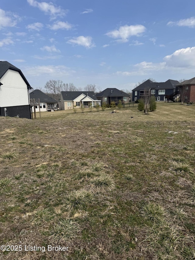 view of yard with a residential view