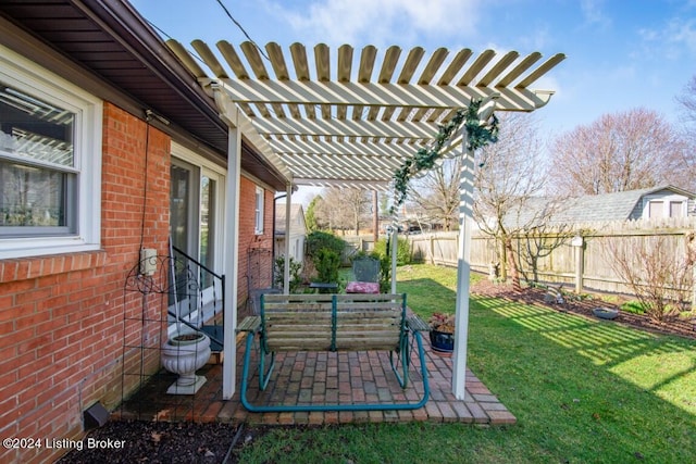 view of yard featuring a patio area, fence, and a pergola