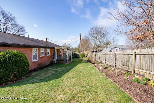 view of yard with a patio and a fenced backyard