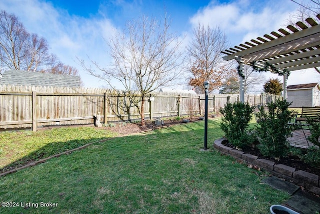 view of yard with a fenced backyard and a pergola