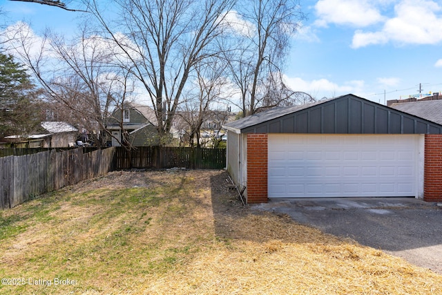 detached garage with fence