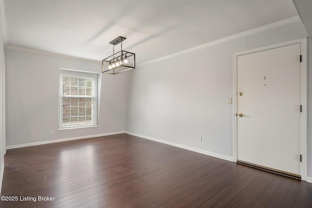 unfurnished room with baseboards, dark wood-type flooring, and ornamental molding