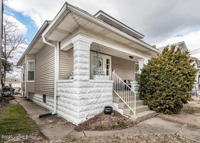 view of front of property featuring covered porch