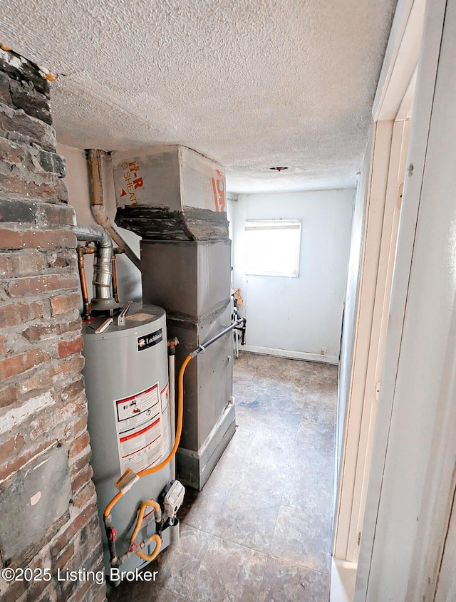 utility room with gas water heater