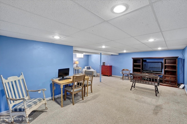 office space with recessed lighting, a drop ceiling, baseboards, and carpet