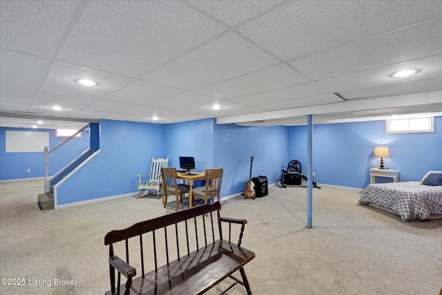 bedroom featuring recessed lighting, baseboards, and a drop ceiling