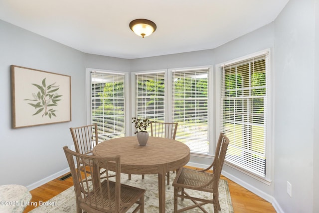 404 Persell Rd, Bedford, KY 40006 - dining space with light wood-type flooring and baseboards