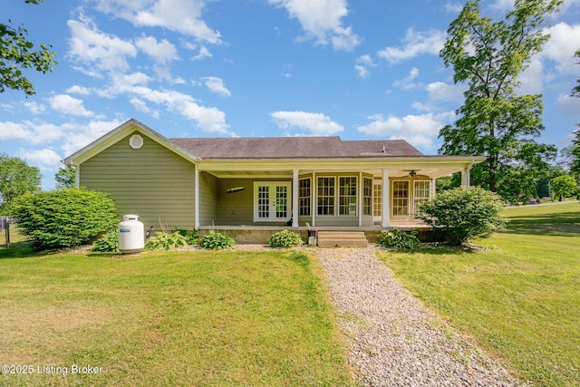 404 Persell Rd, Bedford, KY 40006 - single story home featuring a front yard, french doors, ceiling fan, and a porch