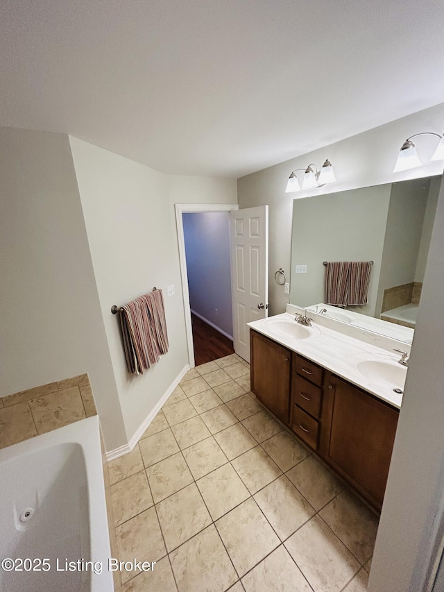 105-A Legacy Ct, Elizabethtown, KY 42701 - full bath with tile patterned flooring, a bathing tub, double vanity, and a sink