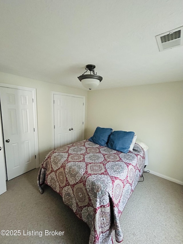 105-A Legacy Ct, Elizabethtown, KY 42701 - bedroom featuring carpet flooring, baseboards, and visible vents