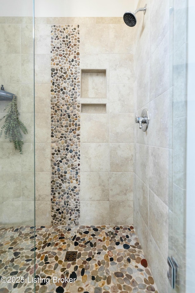 full bathroom with a shower stall